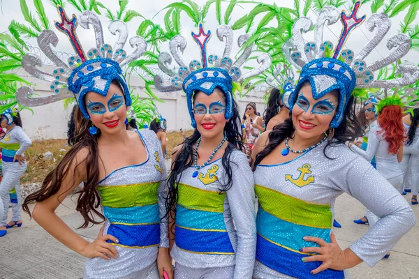 Three colombian girls dancers with colorful and elaborate costumes participate in Colombias most important folklore celebration was declared a Masterpiece of Oral and Intangible Heritage of Humanity — Φωτογραφία Αρχείου