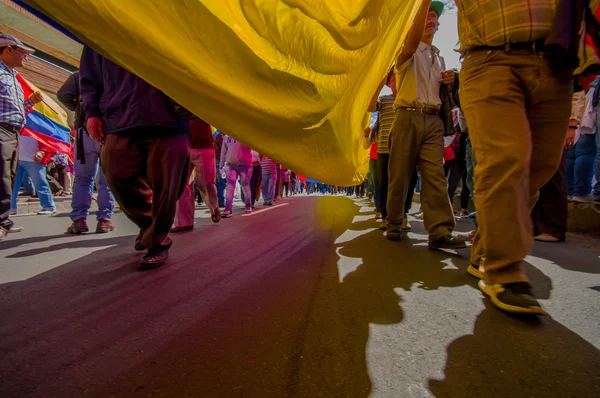 Street view from under giant ecuadorian flag during anti government march and protests in Quito — Φωτογραφία Αρχείου