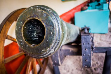 Closeup of an old canon with wheels from Museum Quinta Simon Bolivar Bogota Colombia
