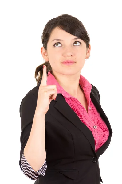 Femme hispanique en chemise rose et veste blazer noire tenant un doigt vers le haut en regardant vers le haut angle latéral — Photo