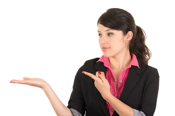 Hispanic woman in pink shirt and black blazer jacket holding hands to the side posing for camera — Stock Photo, Image