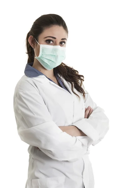 Молодая красивая женщина-врач в маске — стоковое фото