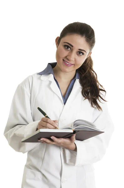 Jonge mooie vrouwelijke arts houden een notebook — Stockfoto