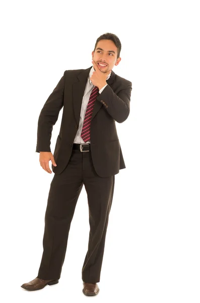 Chico latino en un traje con corbata roja — Foto de Stock