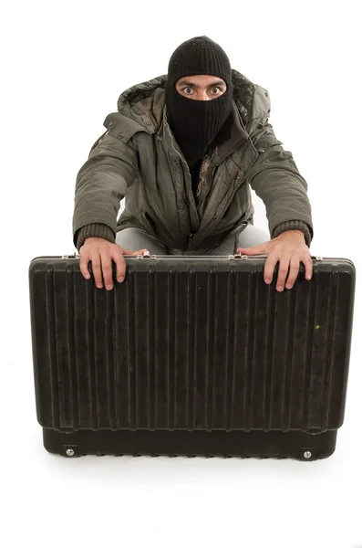 Young thief wearing black hood and jacket — Stock Photo, Image