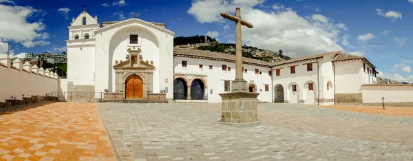 Front view historical church San Diego in old part of Quito showing entire building and beautiful blue sky white clouds shot with, wide angle — 图库照片