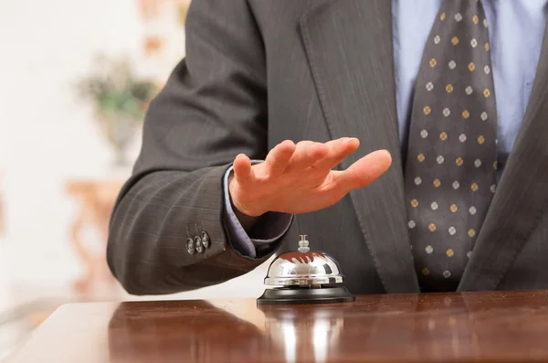 Hotel bell at reception desk — Stock Photo, Image