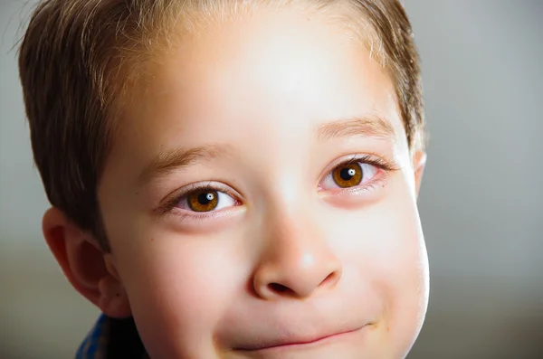 Sweet little boy gesturing sadness — Stock Photo, Image