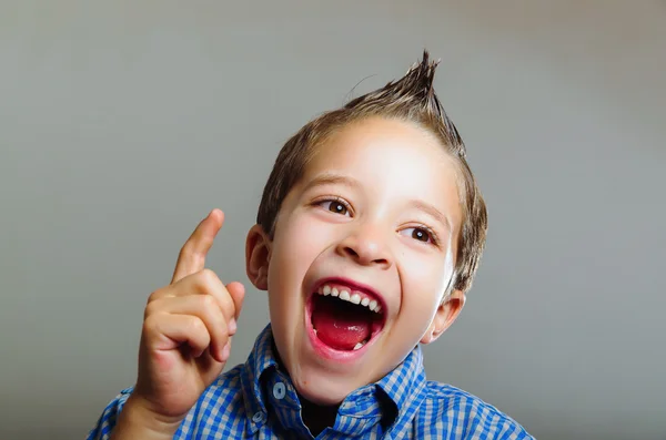 Sweet little boy gesturing idea — Stock Photo, Image