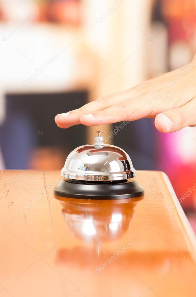 hotel bell at reception desk