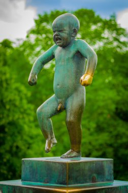 OSLO, NORWAY - 8 JULY, 2015: The most famous sculpture of Vigelandsparken called Sinnataggen in all its glory on a beautiful summer day