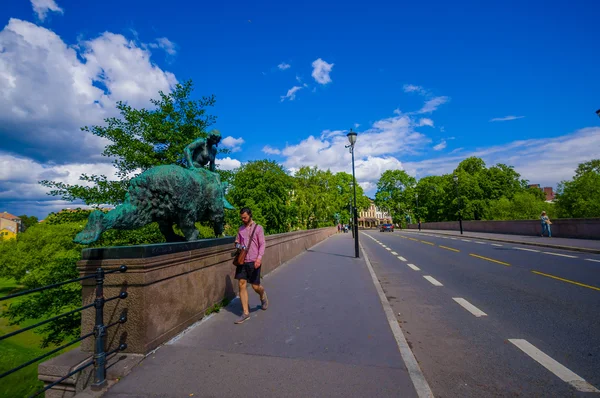 OSLO, NORWAY - 8 JULY, 2015: Famous Ankerbrua with its recognizable animal statues located in the heart of Oslo. This bridge crosses Akerselva which runs through city centre — Stok fotoğraf