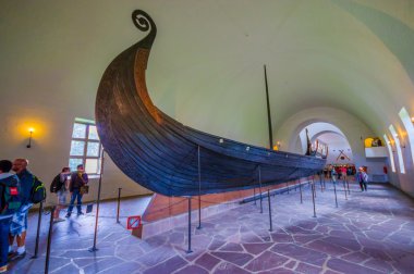 OSLO, NORWAY - 8 JULY, 2015: Beautiful preservation of Osebergskipet as presented in the viking museum at Bygdoy