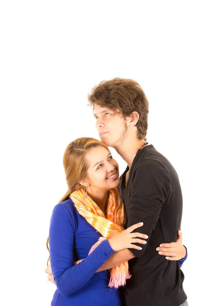 Portrait of attractive young happy couple in love man and woman isolated over white background hugging each other — Stockfoto