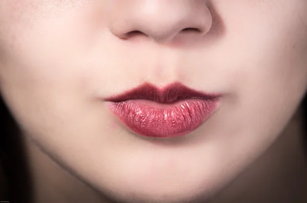 Closeup of pretty young girls mouth — Stock Photo, Image