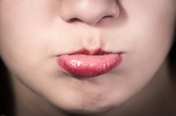Closeup of pretty young girls mouth — Stock Photo, Image