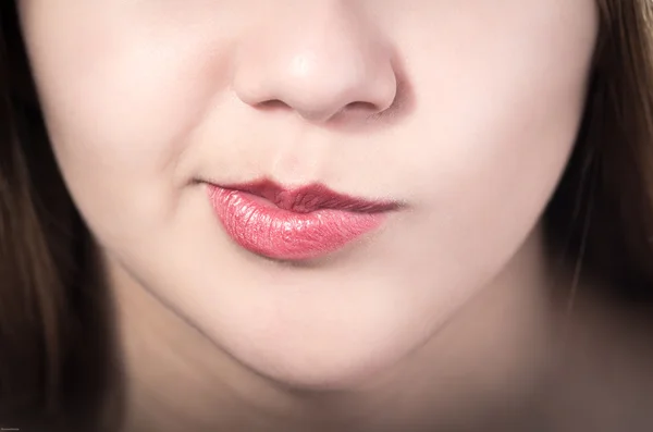 Closeup of pretty young girls mouth — Stock Photo, Image