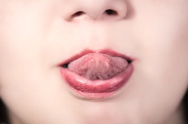 Closeup of pretty young girls mouth — Stock Photo, Image