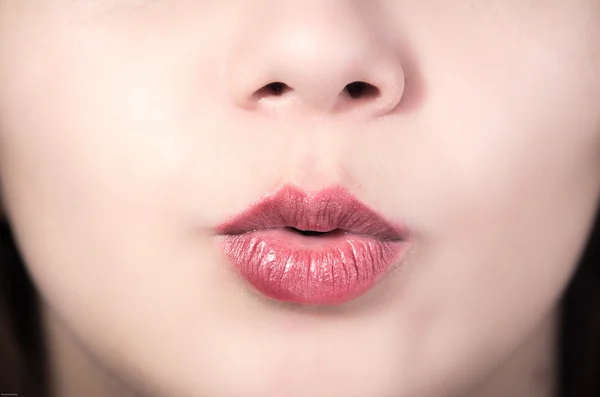 Closeup of pretty young girls mouth — Stock Photo, Image