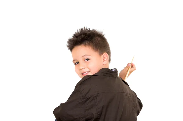 Niño pequeño hacia atrás, mirando a la cámara, dibujando en el aire, aislado sobre fondo blanco — Foto de Stock