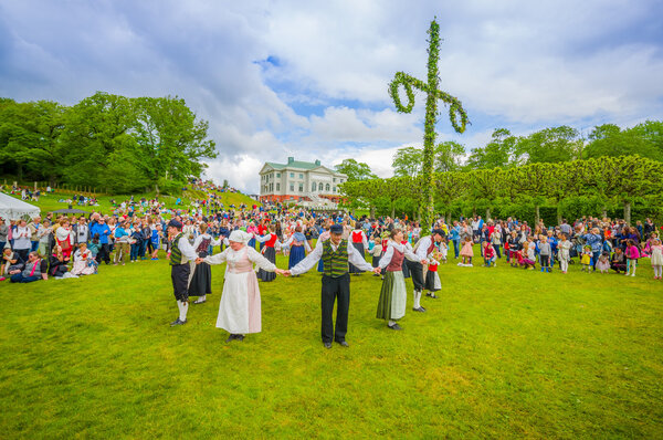 Dancing around the maypole in Midsummer, Gothemburg, Sweden