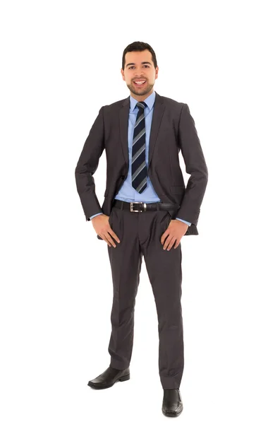 Hispânico homem de pé em um terno — Fotografia de Stock