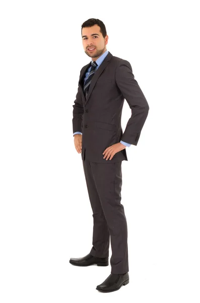 Hombre hispano de pie en un traje — Foto de Stock