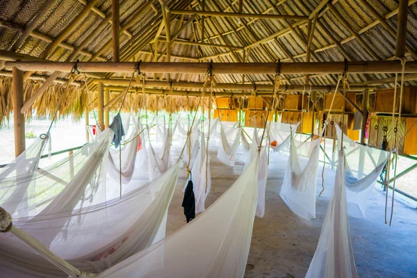 Many relaxing hammocks in a big beach bungalow — Stock Photo, Image