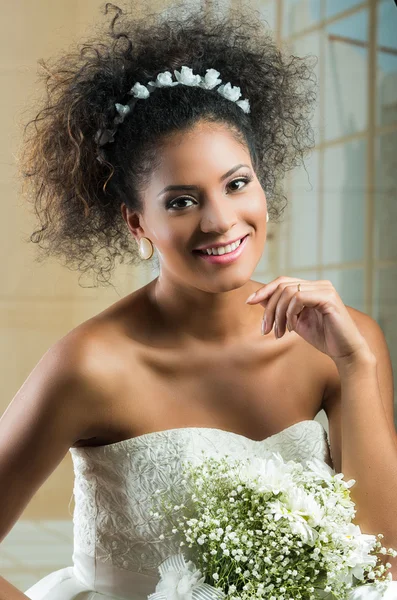 Portrait of beautiful exotic latin bride wearing white dress Stock Image