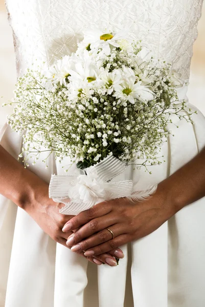 Closeup shot of bridal flower bouquet held by a bride — Stock Photo, Image