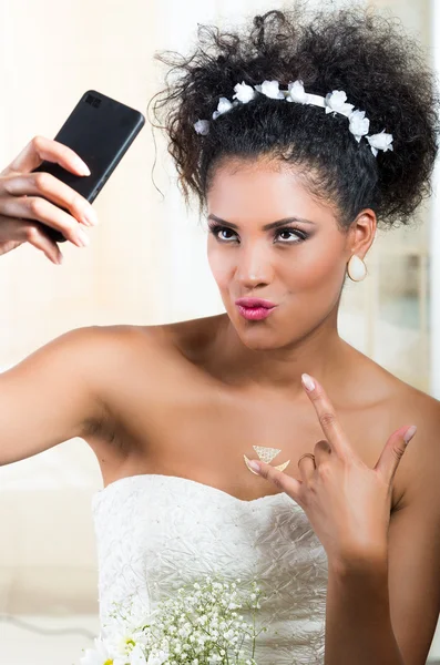 Portrait of beautiful exotic emotional bride taking a selfie — Stock Photo, Image