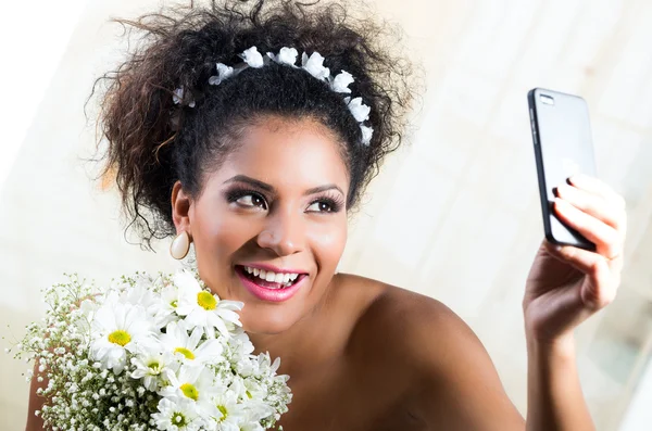 Portrait of beautiful exotic emotional bride taking a selfie — Stock Photo, Image