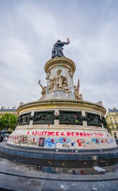 PARIS, FRANCE - JUNE 1, 2015 : Je suis Charlie graffiti in a plaza in Paris against the terrorist attack on Charlie hebdo journal. clipart