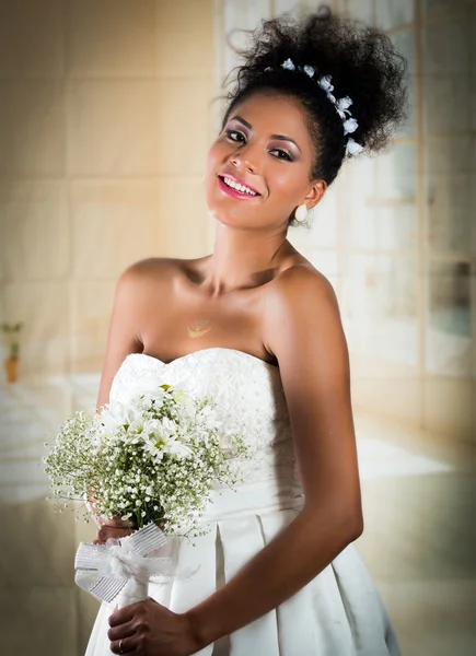 Closeup portrait of hispanic bride holding flower bouquet — Stock Photo, Image