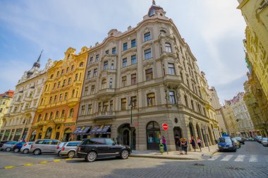 Prague, Czech Republic - 13 August, 2015: Very nice city block with beautiful facades and bridgestone road, typical european victorian architecture