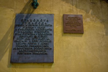 Prague, Czech Republic - 13 August, 2015: Metal plaque with Staranova Synagoga written on it, also known as The Old New Synagogue, more text in smaller letters follows