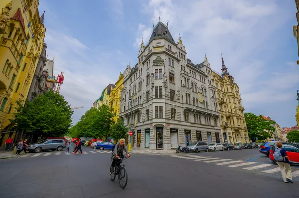 Prague, Czech Republic - 13 August, 2015: Very nice city block with beautiful facades and bridgestone road, typical european victorian architecture