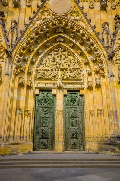 Prague, Czech Republic - 13 August, 2015: Closeup entrance St. Vitus cathedral as seen from front with incredible details and gothic architecture