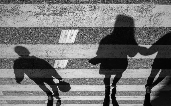 Shadows of pedestrians — Stock Photo, Image