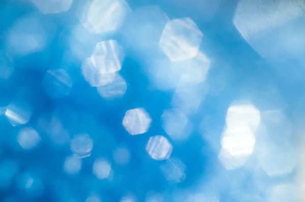 Fondo abstracto azul con forma hexagonal bokeh — Foto de Stock