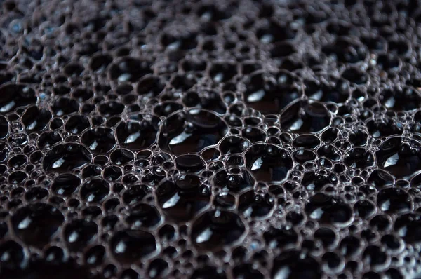 Una gota de agua negra. Fondo abstracto — Foto de Stock