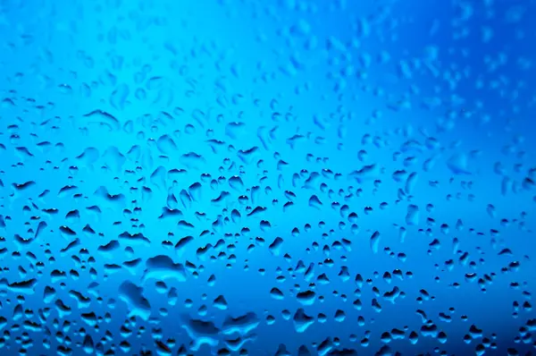 Bolhas Água Isolada Fundo Azul — Fotografia de Stock