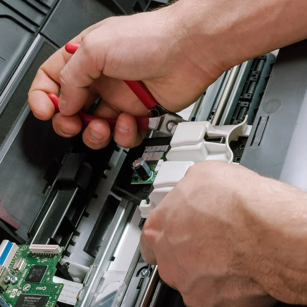 Maintenance and repair of the printer — Stock Photo, Image