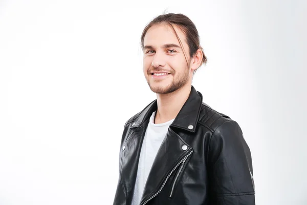 Portrait of handsome smiling young man in black leather jacket — Zdjęcie stockowe