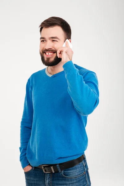 Homem feliz falando ao telefone — Fotografia de Stock