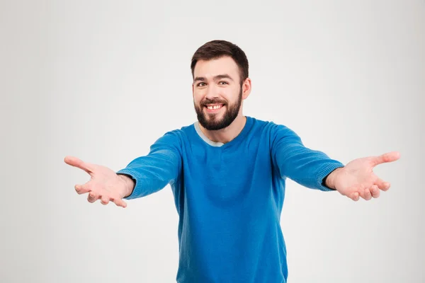 Hombre feliz mostrando gesto de saludo — Foto de Stock