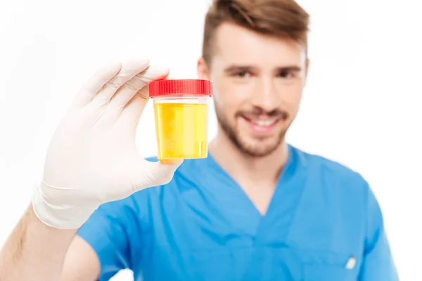 Dokter bedrijf fles van urine monster Stockfoto