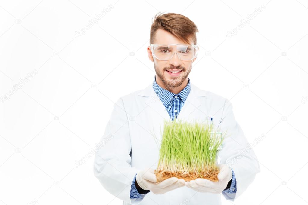 Male engineer showing modified plants