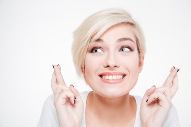 Smiling woman with fingers crossed gesture clipart