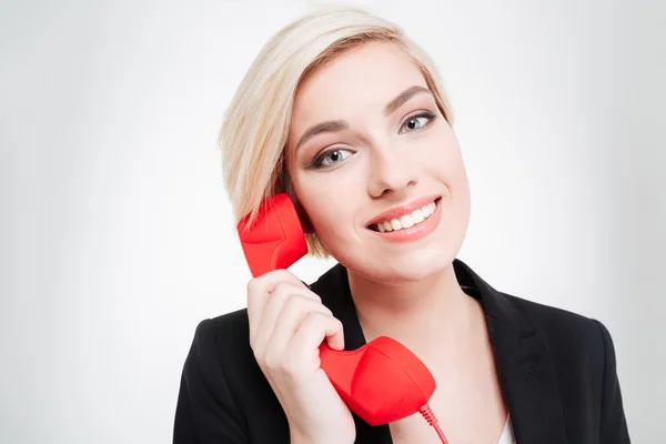 Бізнес-леді розмовляють на ретро трубці телефону — стокове фото